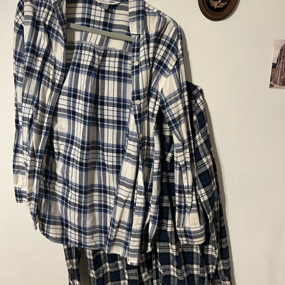 Two plaid button up flannels